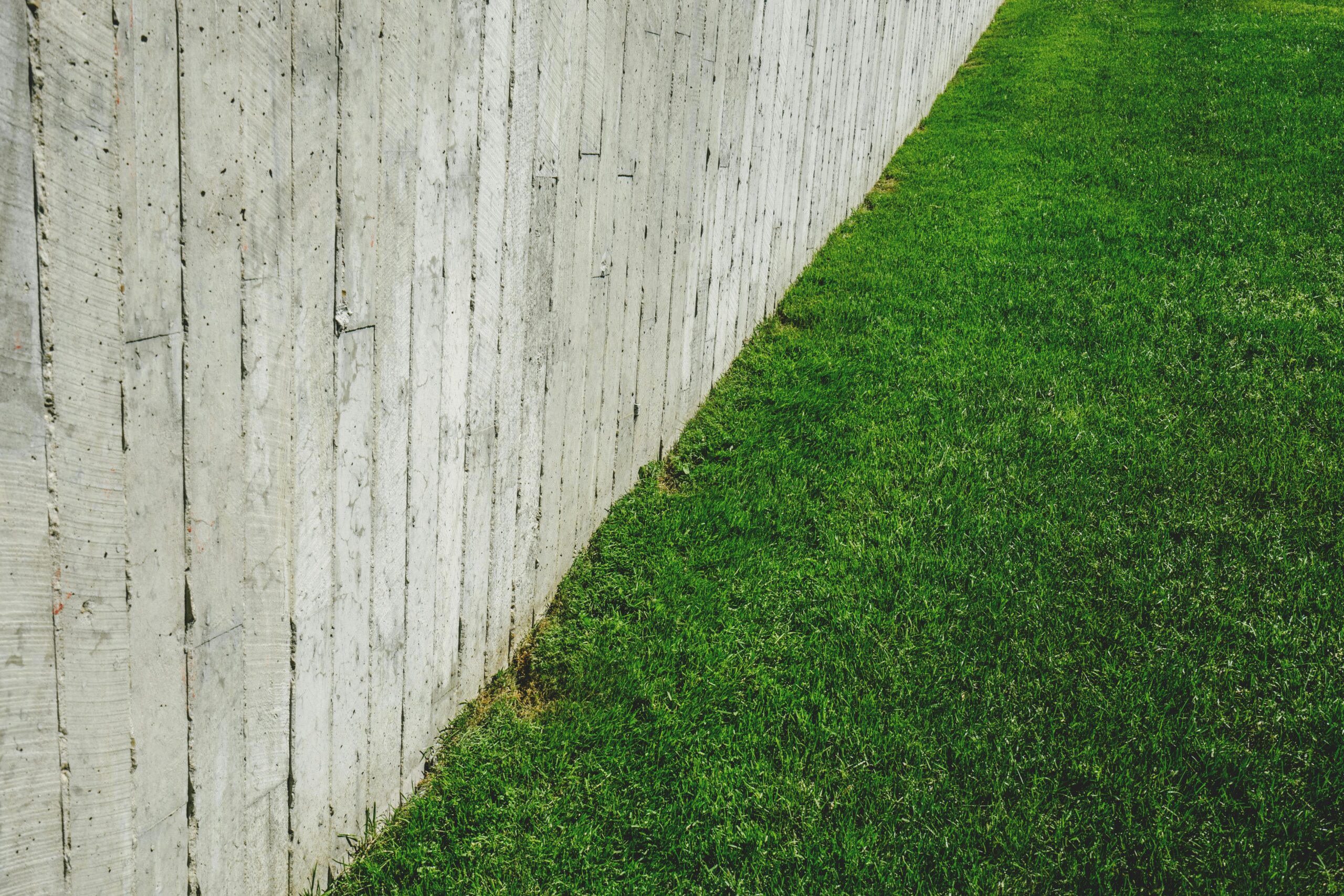 How to Use a Grass Cutter Near Walls