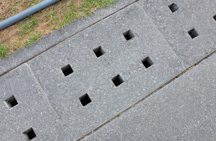 How To Disguise Drain Covers In Garden